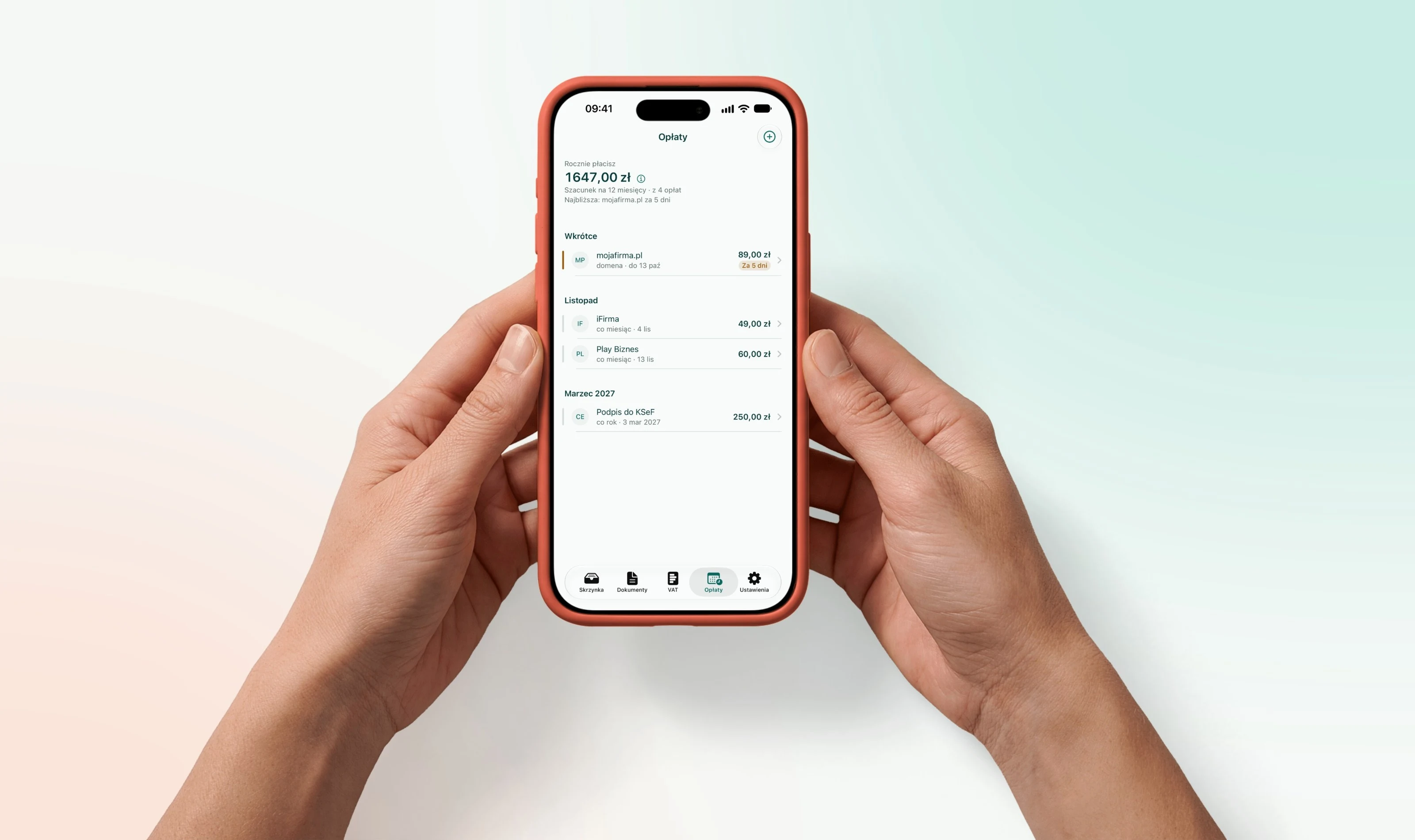 JDGkit — iPhone w dłoniach z ekranem stałych opłat: roczna suma, najbliższe płatności i abonamenty