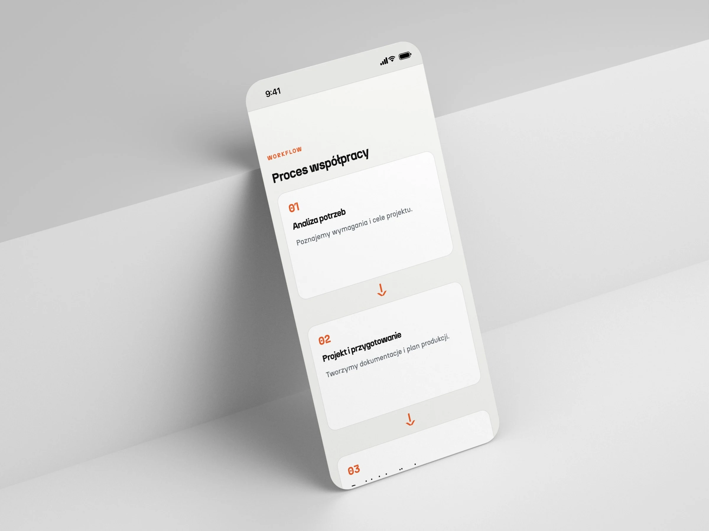 machinesmanufacturing.eu — projekt strony internetowej, mockup telefon scena schodek